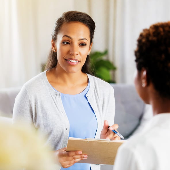 therapist and child at appointment